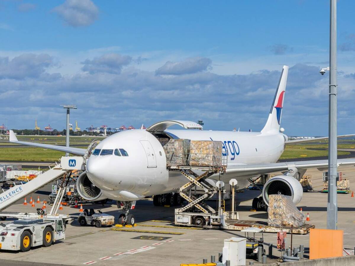Cargo being loaded into an aircraft on the tarmac
