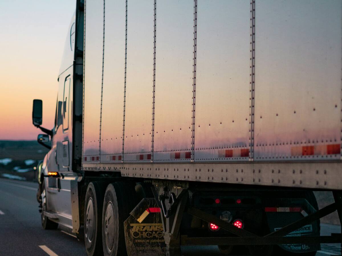 Freight truck on the highway at dusk